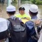 Evakuasi puluhan santri Pondok Pesantren (Ponpes) Al-Fattah yang terdampak banjir di Kampung Seglok, Desa Pasir Bolang, Kecamatan Tigaraksa l Dok. Istimewa