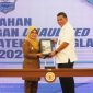 Bupati Dewi Setiani saat menyerahkan LKPD Unaudited 2025 kepada Kepala BPK Perwakilan Provinsi Banten Firman Nurcahyadi di Auditorium Kantor BPK Perwakilan Provinsi Banten, Senin, 30 Maret 2026. | Dok. Istimewa 