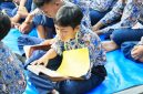 Salah satu siswa SMPN 5 Kota Serang saat sedang membaca Al-Quran, dalam acara Tasyakuran dan Tadarusan bersama Walikota Serang Budi Rustandi di lapangan sekolah tersebut I Dok. Roy-BNC